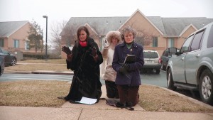 Image of antiabortion protestors in a scene from Martha Shane and Lana Wilson’s After Tiller.